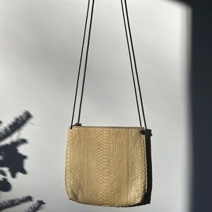 B.may cream python crossbody